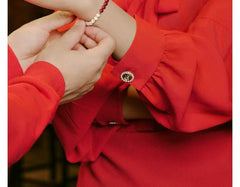 Pulsera de cinabrio y cuentas blancas